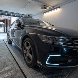 The car is parked on the parking platform in the entrance hall