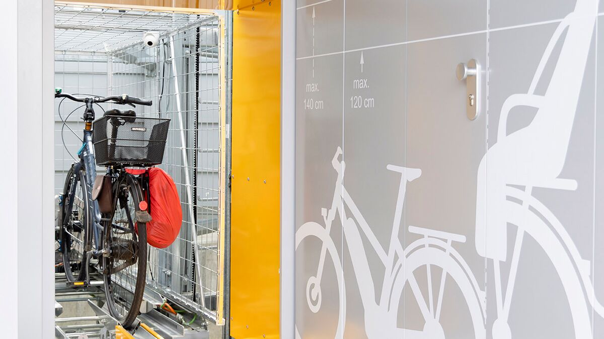 Bicycle on a rail in an automatic bicycle parking system
