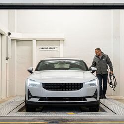 The image shows the transfer area of an automated parking system where the vehicle is parked by the driver.
