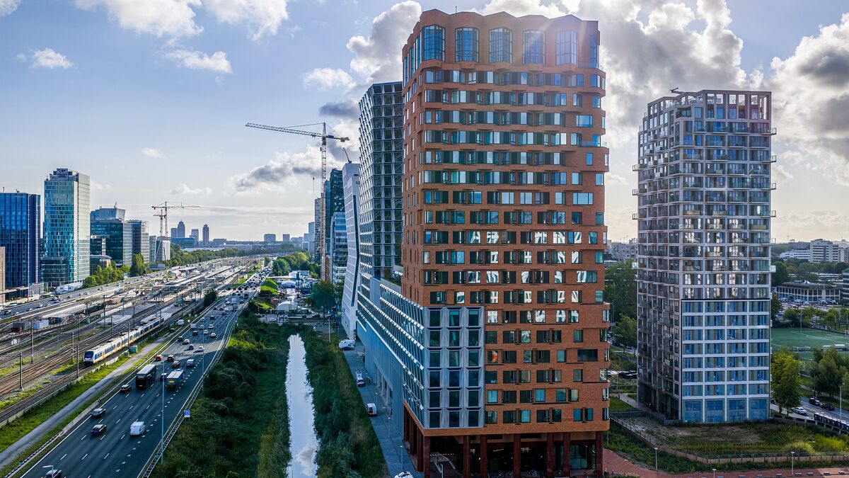 Modern urban district with high-rise buildings, green spaces, and good infrastructure.